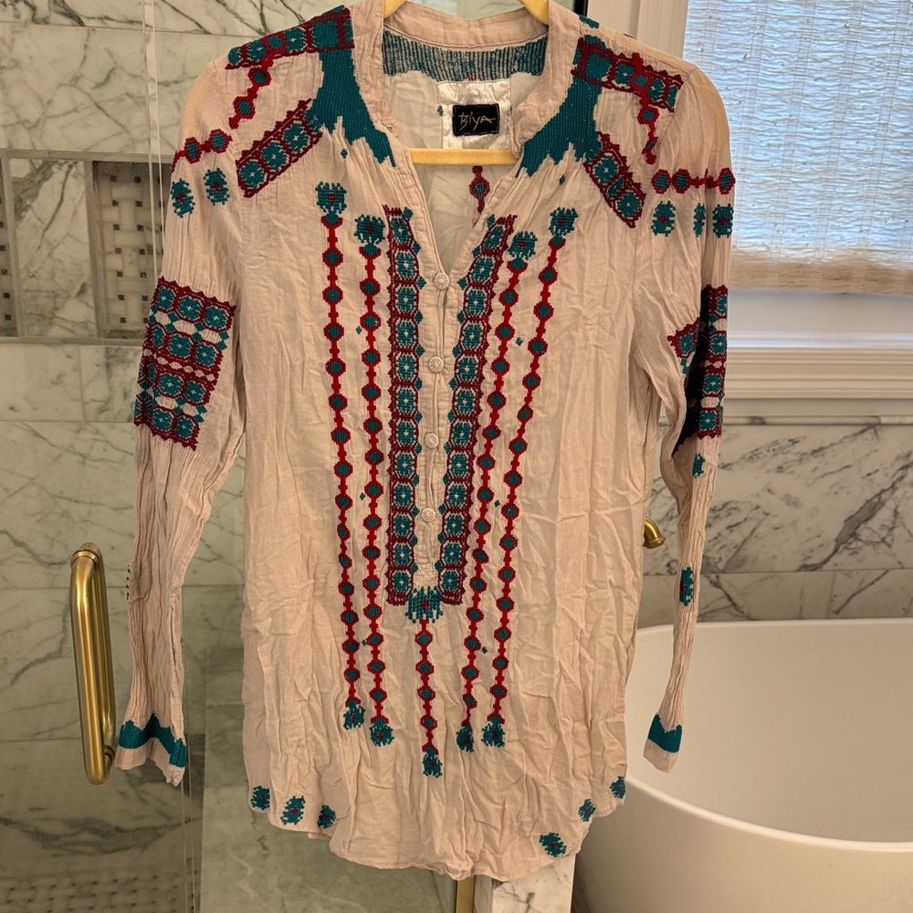 Stylish Embroidered Tunic with Red and Teal Accents